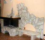 Fireplace Pantano:crazy paving in tumbled slab trani stone